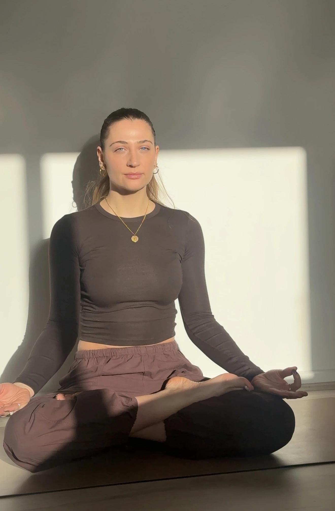 Psychologist Monique Girardo sitting on a chair
